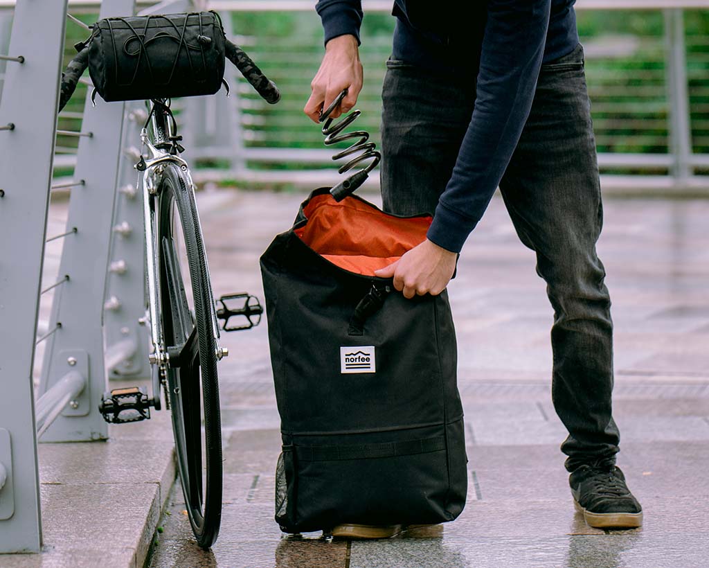 Roll top shop commuter backpack